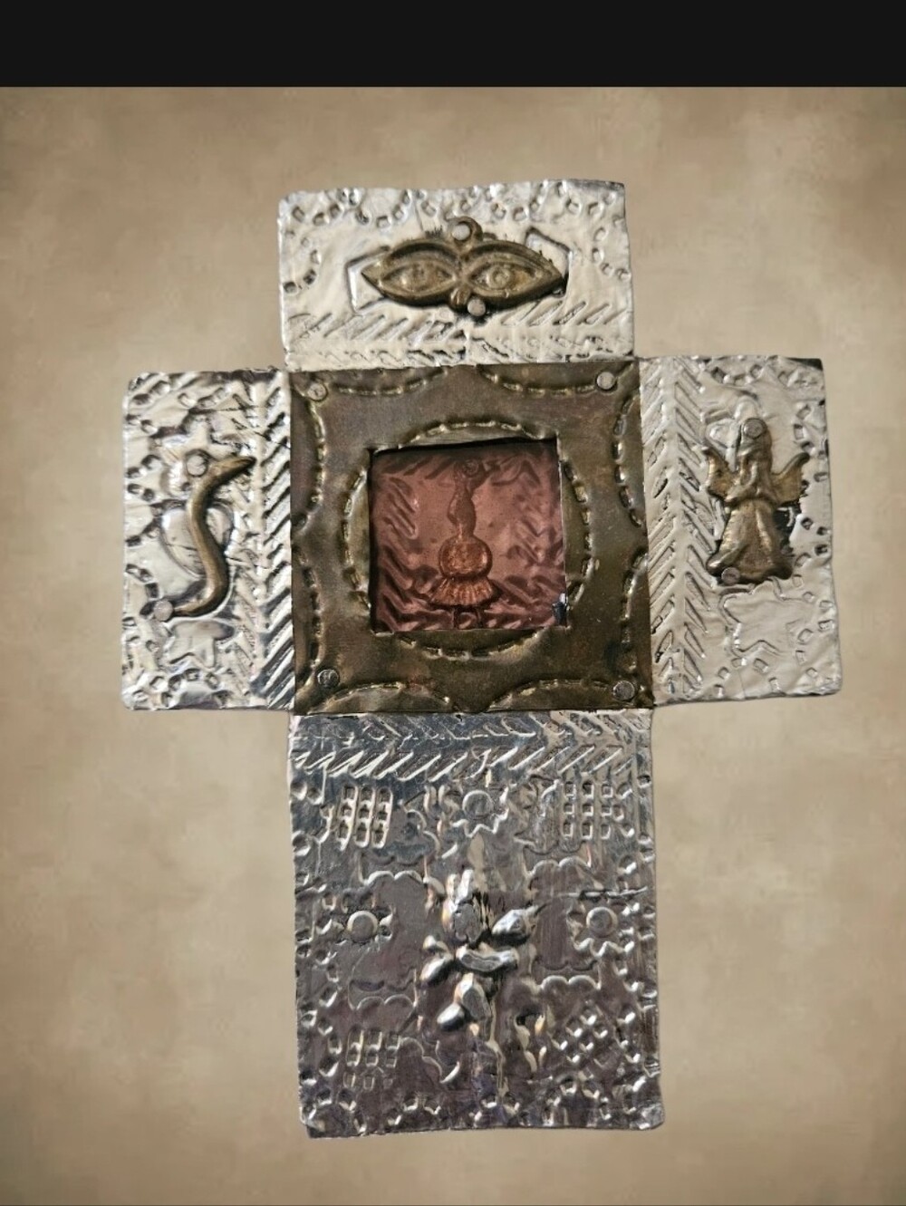 Handmade Mexican Milagro Cross features hand-embossed Tin